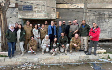 Chargée d’affaires Yngvild Berggrav (centre) flanked by Country Director Erik Paulsen and NPA’s mine action team in Yarmouk Camp