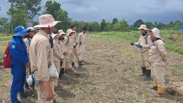 Team leader briefs his team before demolition of found EO at the clearance site in Saravane province 19052025