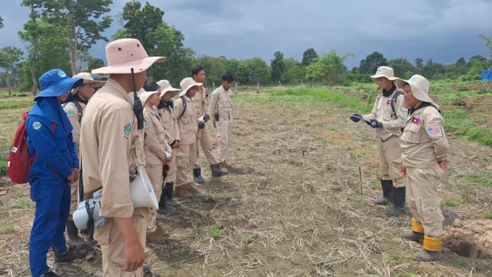 Team leader briefs his team before demolition of found EO at the clearance site in Saravane province 19052025