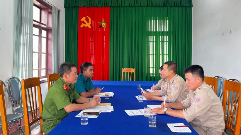 243 NPA Hue NTS completion in A Luoi 220825 The survey team meets with local authorities to report findings and plan next steps